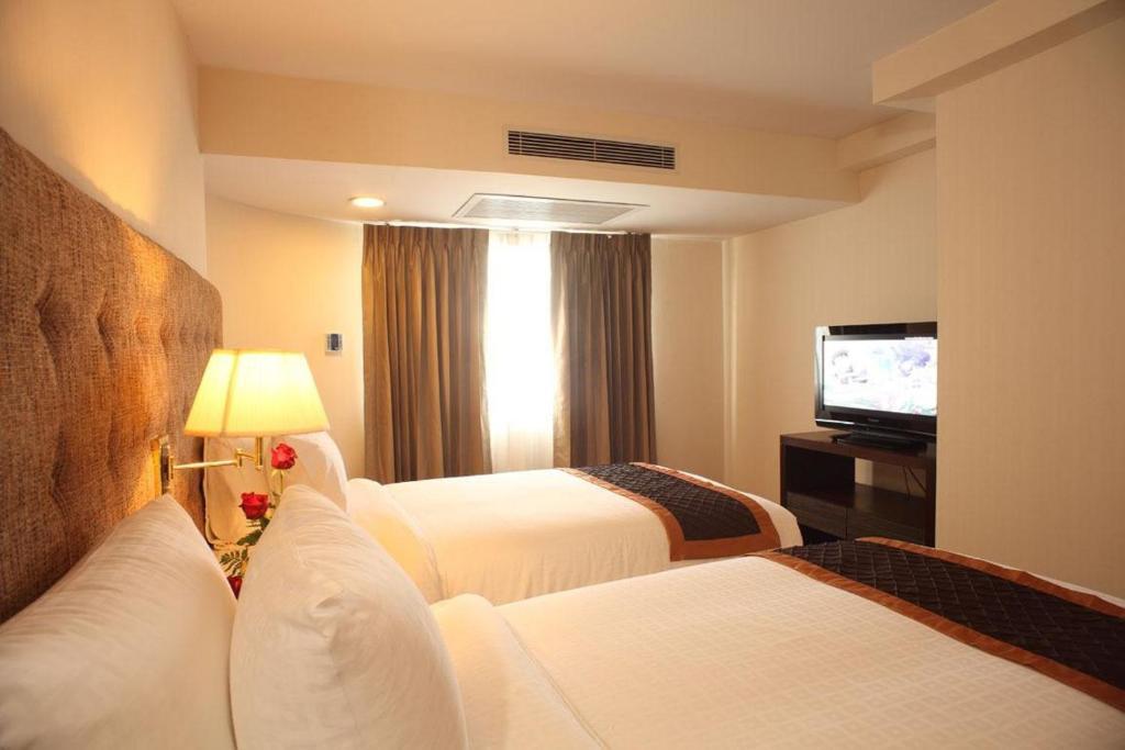 Furama Chiang Mai Hotell Rum bild