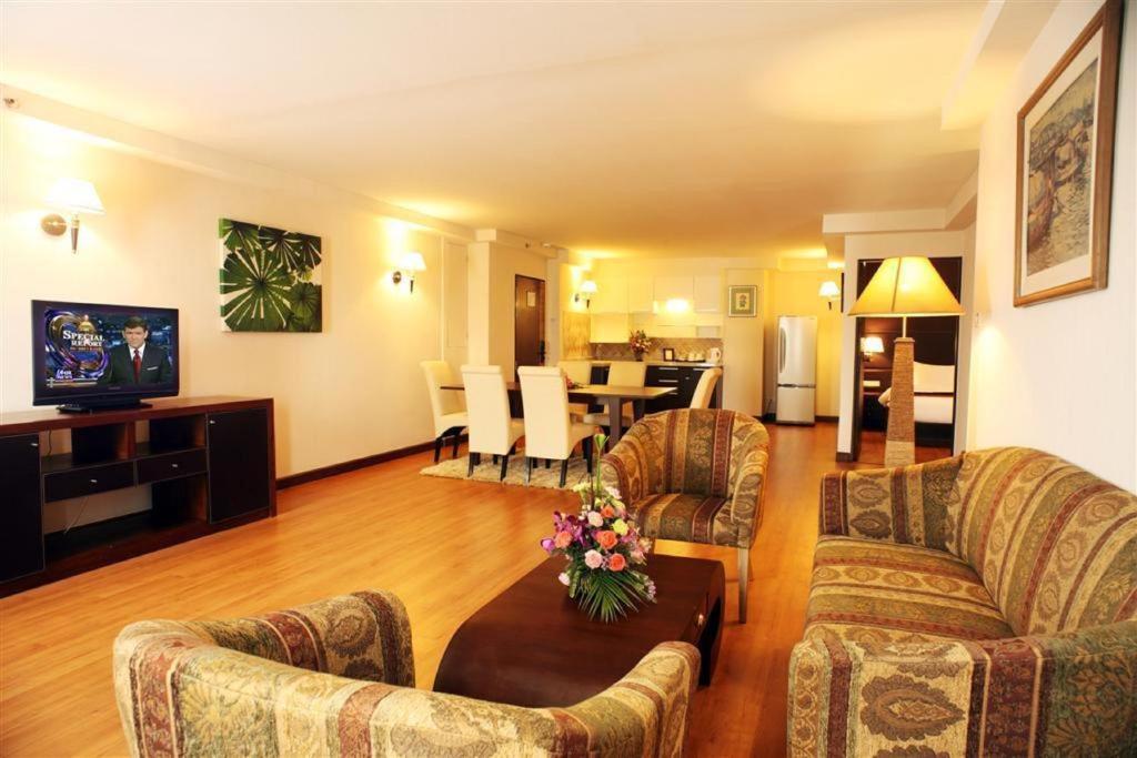 Furama Chiang Mai Hotell Rum bild